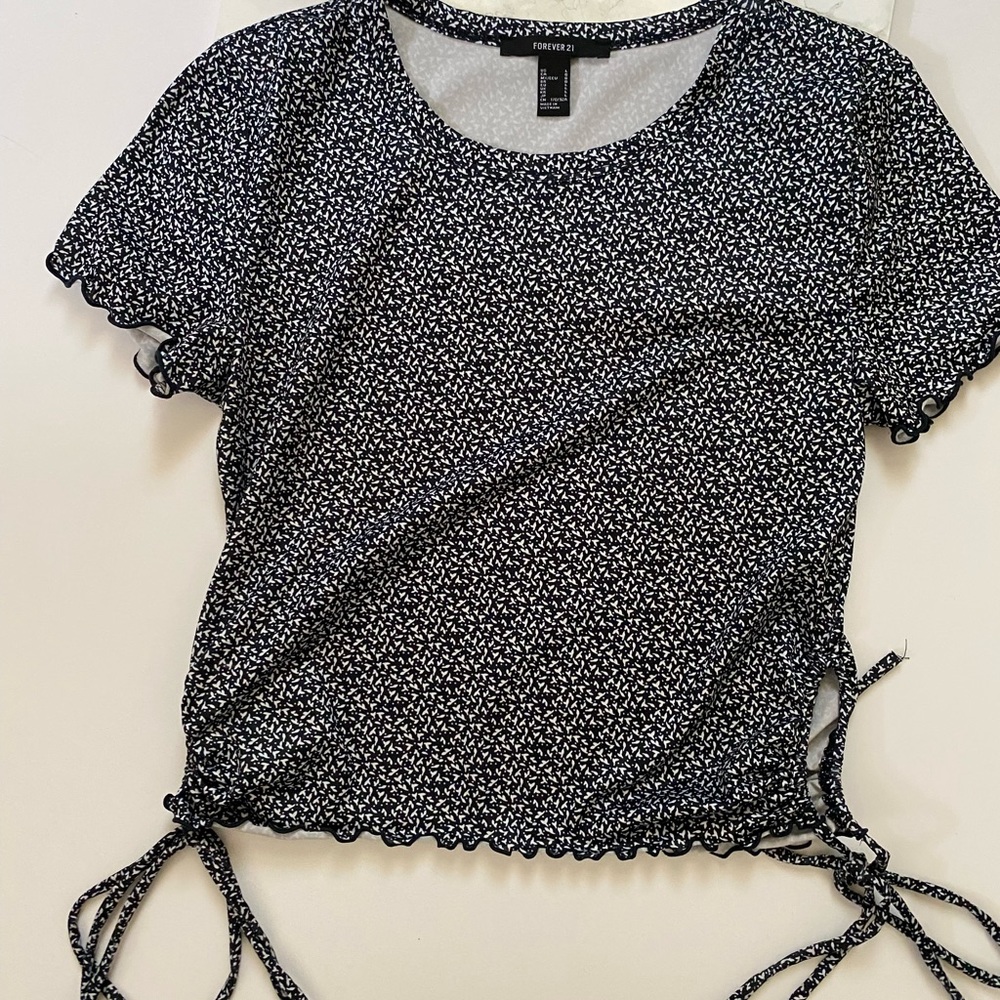 Forever 21 crop top w/ ruffled bottom open slots on sides, draw strings/tighten